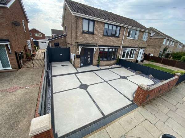 Modern home improvement project featuring a contemporary paved driveway and stylish exterior by Kaye & Co Construction in Grimsby.